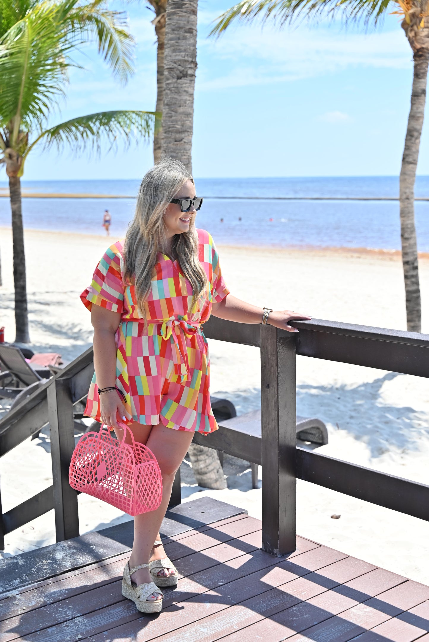 Eyes On You Coral Geo Abstract Surplice Woven Romper